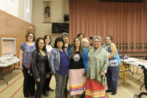 Group of women smiling at Victims and Survivors of Crime Week Regina Meeting